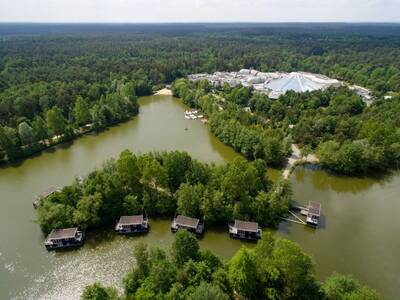 Aerial view of the park lake with houseboats from Center Parcs Bispinger Heide