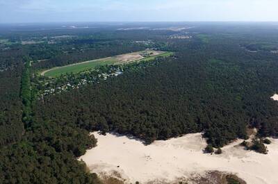 Aerial view of the Europarcs EuroParcs De Wije Werelt holiday park in the Veluwe woods