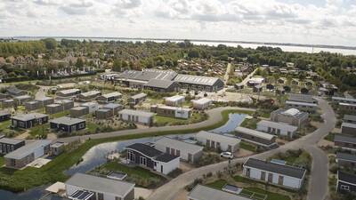 Aerial view of the EuroParcs Poort van Zeeland holiday park and the Haringvliet