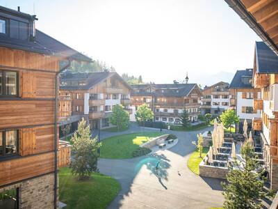 Summer photo of apartment buildings at Landal Alpen Resort Maria Alm