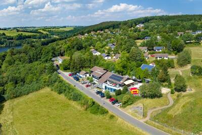 Aerial view of the Roompot Eifelpark Kronenburger See holiday park and the surrounding area