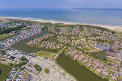 Aerial view of the Roompot Zeebad holiday park and the North Sea beach