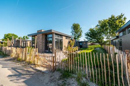 Vakantiehuizen met omheinde tuin op vakantiepark EuroParcs Poort van Zeeland