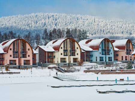 Winterfoto met sneeuw op vakantiepark Landal Waterpark Marina Lipno
