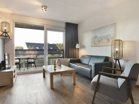 Gezellige zithoek met balkon van een appartement op Landal West-Terschelling