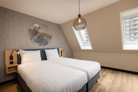 Slaapkamer in een appartement op Roompot De Graaf van Egmont