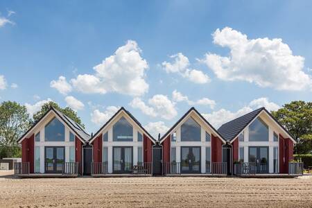 Chalets "Strandlodge" op het strand op het kleinschalige vakantiepark Roompot Waterpark Langelille