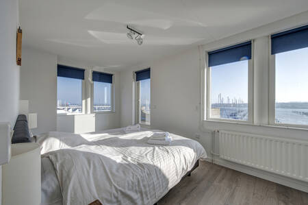 Slaapkamer van een appartement op Summio Marina Port Zélande
